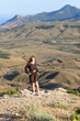 © Ekaterina Utorova - Young woman dancing on the top of Starfall of Memories hill, Koktebel, Crimea