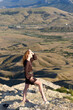 © Ekaterina Utorova - Young woman dancing on the top of Starfall of Memories hill, Koktebel, Crimea
