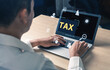 © InfiniteFlow - Concept of tax preparation and financial compliance. Filing official tax documents and forms for government reporting, auditing, and financial accounting purposes. Fermion