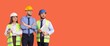 © Pixel-Shot - Three smiling construction workers and engineers wearing hard hats and safety vests, isolated on an orange background