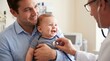 © Taras Roshchuk - A father is holding his baby in a clinic while a doctor uses a stethoscope to check the baby's heart. The baby smiles happily during the check-up