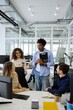 © Drobot Dean - Diverse business team having meeting during a collaborative office meeting