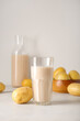 © Pixel-Shot - Glass of tasty potato milk on light background