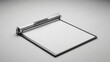 © Joe Jonathan - A metallic industrial clipboard rests on a flat surface providing a sturdy platform for taking notes during important business meetings or while tracking necessary documentation for various