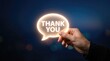 © MSTAnuara - Hand glowing thank you speech bubble light effect
