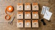 © xoss gallery - Halloween craft gift bags with orange ribbons and bat stickers on wooden table. DIY holiday party favors with scissors and ribbon roll. Rustic autumn celebration packaging set.