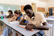 © AresStudio Belen y Carlos/Stocksy - Diverse students learning and studying in classroom