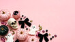 © KAI - Pink Coquette Halloween Flat Lay with Pastel Pumpkins, Friendly Ghosts, Skull and Black Bows with Copy Space