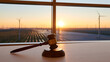 © twc - Gavel on Desk with Wind Turbines and Solar Panels at Sunset, Representing Green Energy Legislation and Policy