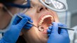 © ardiright - Close Up of a Dentist Examining Patient's Teeth using Sterile Tools in a Modern Dental Clinic