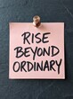 © MDWAHEDALI - Motivational Sign Saying Rise Beyond Ordinary On Pink Board