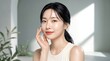 © Jasna57 - Korean woman with glowing skin clean minimalist studio portrait skincare beauty routine advertisement for spa banner