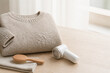 © Hongbo - Wool Sweater Care with Fabric Shaver and Lint Brush