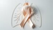 © Gul Ahmad Artworks - Peach awareness ribbon placed over white relief sculpture of human lungs on bright clean surface