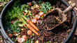 © Маргарита Пархоменко - Compost bin filled with organic kitchen scraps and earthworms actively decomposing waste