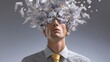 © Naphatson - Surreal businessman with head exploding into paper fragments representing mental stress.