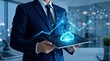 © Li - Business professional holding tablet displaying cloud computing data security hologram, digital transformation technology innovation in modern office environment