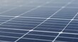 © Kwek - Close-up macro photograph of a shimmering solar panel surface, showcasing the intricate grid pattern for clean energy generation.