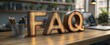 © Milana - Large illuminated wooden FAQ letters on a tidy wooden office desk with pencil cup, laptop, shelves and plants in a warm, welcoming modern workspace conveying helpful guidance
