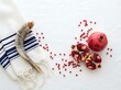 © Aklima - Rosh hashanah holiday symbols with shofar, pomegranates and tallit isolated on white background