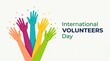 © ID008 - Colorful raised hands representing diversity and community support during the official celebration of international volunteers day on a white background