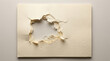 © Al_vector - Torn paper with a ragged hole reveals a white background a damaged and distressed texture fragmented ripped ruptured shredded cardstock cellulose fiberboard sheet blank void
