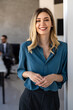 © NDABCREATIVITY - A confident businesswoman leads in corporate culture, business growth, and global finance