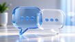 © HP - Transparent glass 3D speech bubbles on a desk in a bright office background representing corporate communication and modern business dialogue