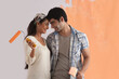 © IndiaPix - Handsome young couple spending romantic time while painting house