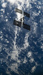 © Metadancer - A manned orbital station orbiting earth with solar panels and clouds