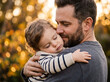 © VISUAL BACKGROUND - Loving father carrying and embracing tired toddler daughter at sunset