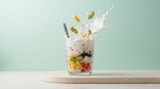 Refreshing fruit dessert splash with spoon and beverage
