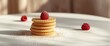 © pngking - Waffle Stacks Topped with Raspberries on a Table with Sugar Dusting