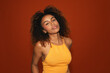 © Gonzalo Infiesta - Confident young woman with curly hair posing