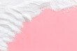 © 9dreamstudio - Washing powder scattered on pink background top view frame copy space