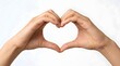 © imstockshoot - Two hands making a heart shape sign with fingers against a plain white background