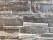 © Bugyi - Black split face quartzite stone wall ledger panel texture