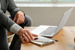 © Pixel-Shot - Mature businessman with mobile phone working in office, closeup