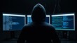 © Aqeela - Hacker wearing hoodie sitting in dark room working on multiple computer monitors with green glowing lines of programming code