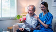 © Aryanto - Asian female nurse assisting senior man during dumbbell exercise in home rehab session for physical therapy support and healthy active aging care program