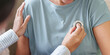 © Natee Meepian - Doctor checking senior patient heart with stethoscope at home visit