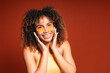 © Gonzalo Infiesta - Young woman applying under eye patches for skin care