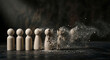 © Abdal - A sequence of small wooden human figures slowly falling apart moving from left to right illustrating change and feelings of vulnerability