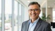 © rahwik - confident diverse business professional smiling in bright modern office for corporate website about us trust services portrait