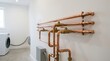 © atomic - pipes in wall building