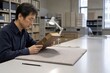 © gn8 - Library Archive Digitization Archivist Checks Bound Volume Condition