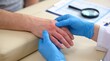 © Moopingz - A healthcare provider wearing blue gloves conducts a physical examination on a patient's hand.