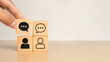 © Achmad Khoeron - For negotiating business, deal, agreement, collaboration concept. Business communication for cooperation, partnership, contract agreement. Partner dialogue. Hand and business icon wooden cube blocks