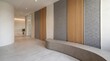 © starush - Layered acoustic wall finishes in a reception corridor