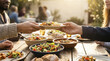 © pattaphorn - Vibrant co living community shares meal outdoors celebrating culture and connection
